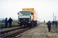 Автомобили МАЗ на комбинированном железнодорожном ходу